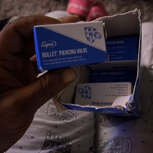 Bullet piercing valve